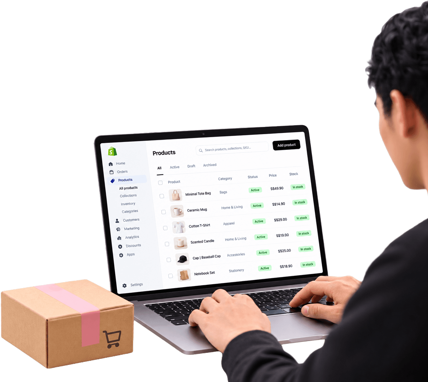 A person managing a Shopify products list on a laptop, with a shipping box beside it