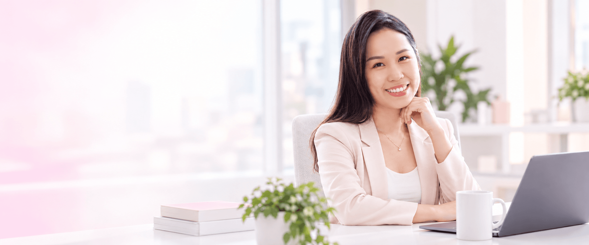 Janice Lai, Business Development Manager at PGrowth, at her desk